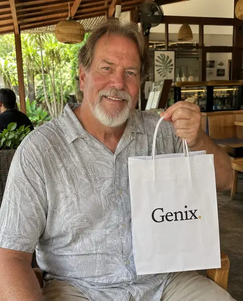 A Genix customer in Bali receiving their sealed delivery parcel