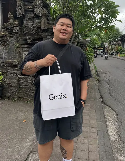 A Genix customer in Bali receiving their sealed delivery parcel