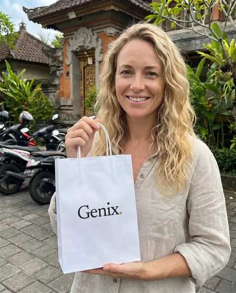 A Genix customer in Bali receiving their sealed delivery parcel