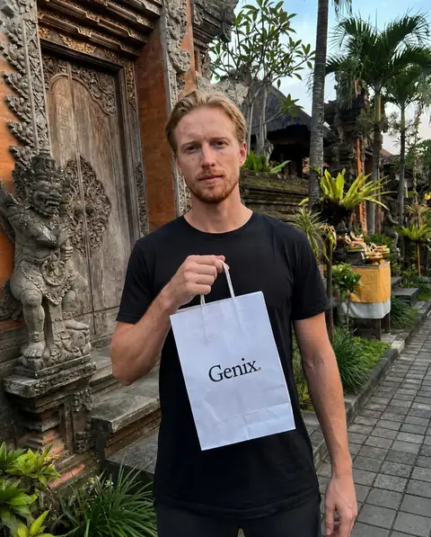 A Genix customer in Bali receiving their sealed delivery parcel